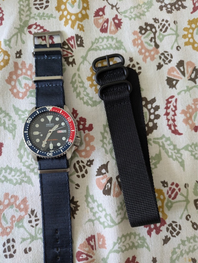 Seiko Men&rsquo;s Watch – SKX009 on a blue nato plus a black nato strap.