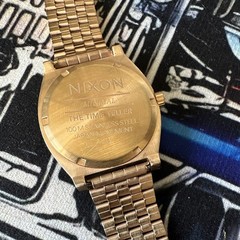 Nixon The Time Teller Minimal Quartz 100m Gold Stainless Steel Pink Dial Watch