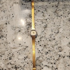 Seiko Quartz Women’s Gold Tone Mesh Band White Dial Arabic Numerals Analog