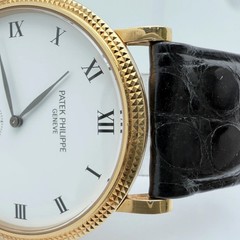 Patek Philippe 3919J Calatrava 33mm 18K Yellow Gold White Porcelain Dial Watch