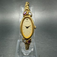 Seiko Watch Women 13mm Champagne Dial Gold Tone Oval 1E20-5760 New Battery Gems